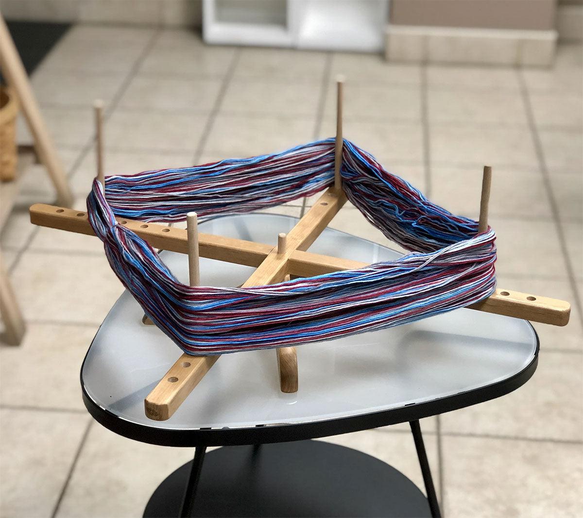 Wooden wool reel on chiaogoo table