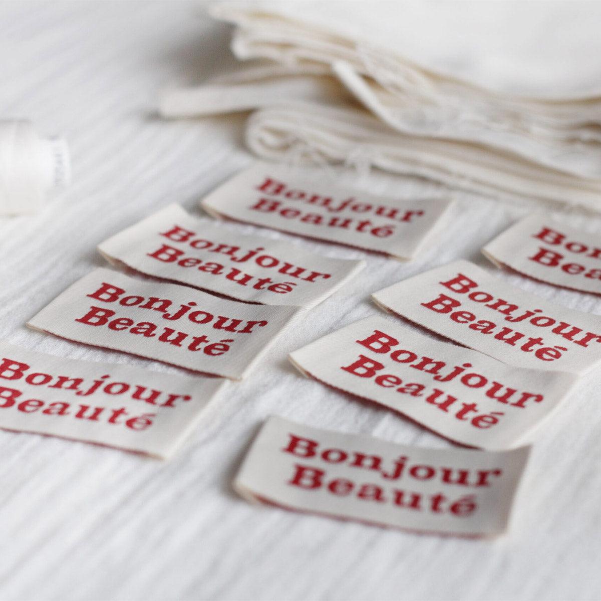 Lot de 8 étiquettes à coudre - Bonjour Beauté