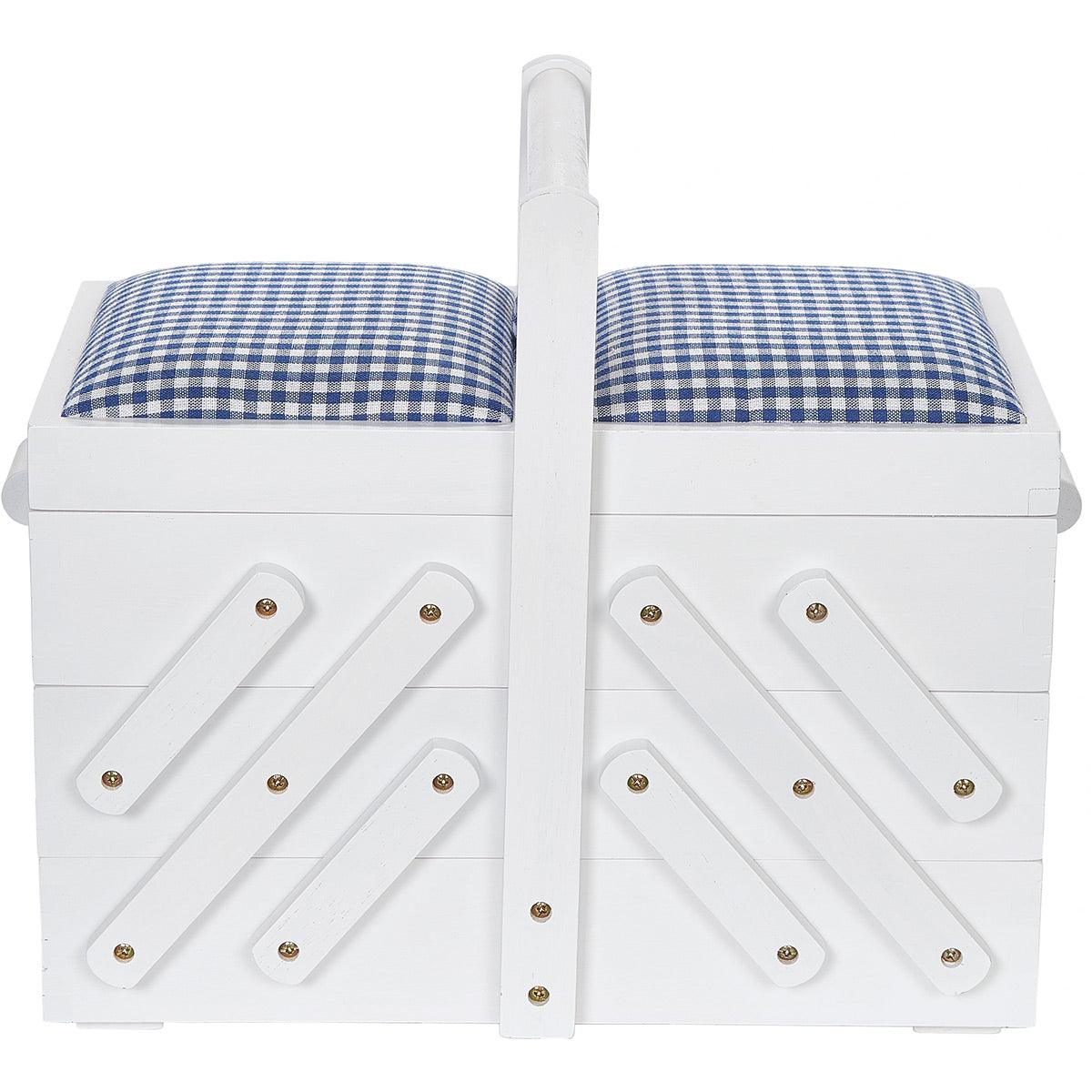 White wood sewing worker with blue gingham fabric m