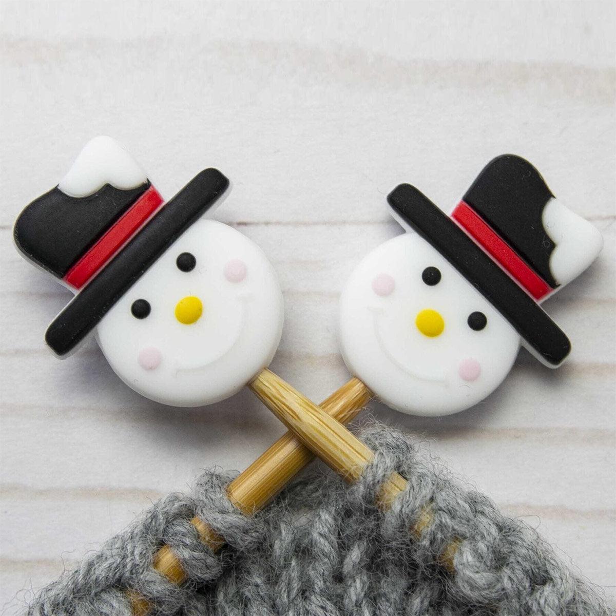 Candle stops for knitting needles - snowman