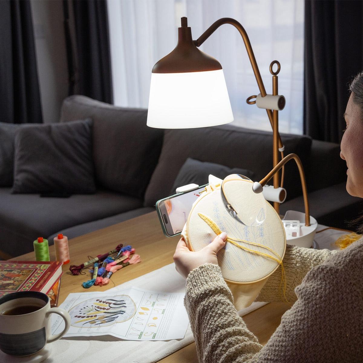 Table lamp with magnifying magnifying glass, tray and phone pliers