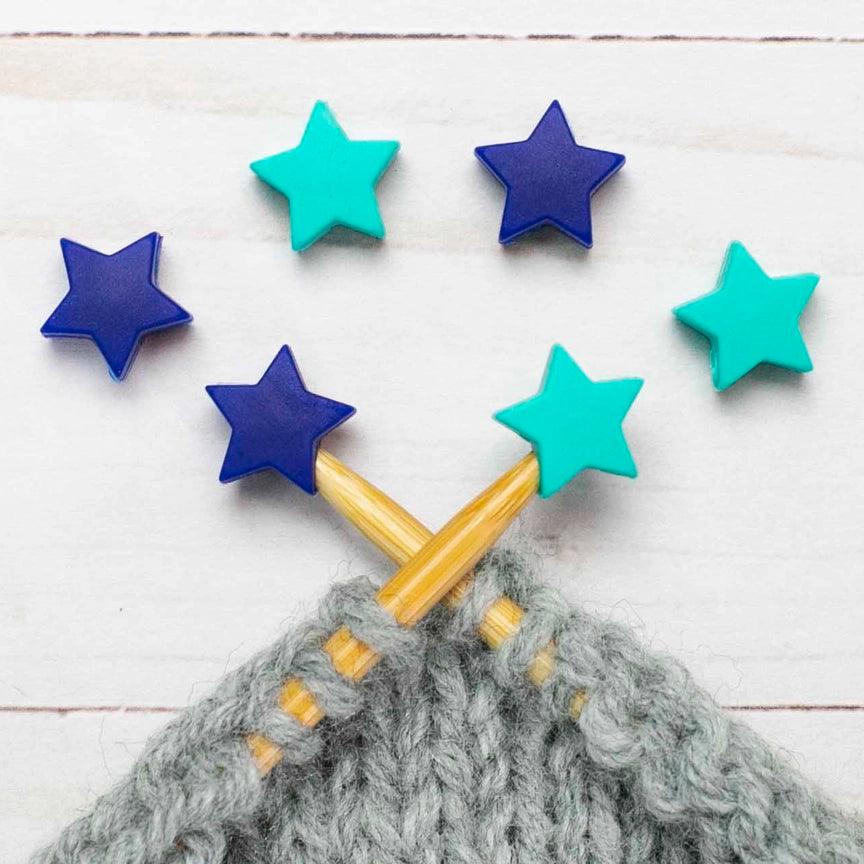 Candle stops for knitting needles - blue and green stars